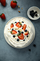 Pavlova meringue dessert with fresh berries