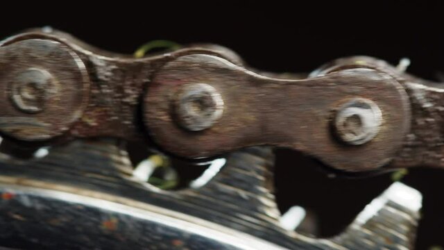 close up macro rusty bike bicycle chain and gear