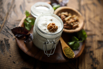 Homemade yogurt sauce with walnut and spices