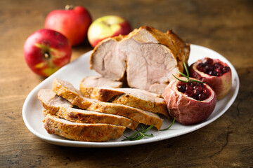 Homemade roasted pork with apples and cranberry