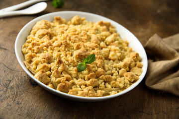 Traditional homemade crumble dessert with fresh mint