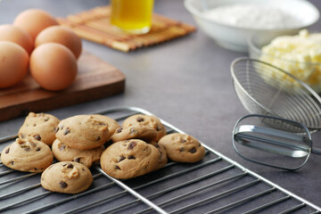 Baking cooking and ingredients on a black background, top view.