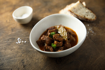 Traditional beef ragout with bay leaf