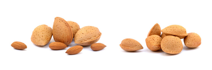 Heap of fresh almonds in shells isolated on white background