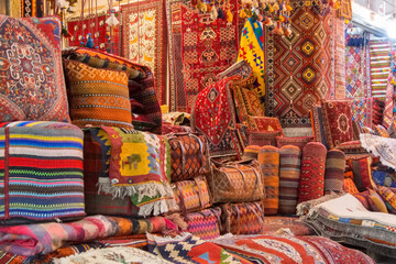 Carpets and gabbehs at a market in Iran