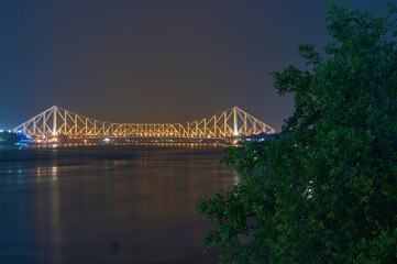 Howrah bridge at dusk in Kolkata India