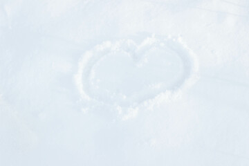 
A HEART PAINTED ON WHITE SNOW, ROMANTIC MINIMALISM