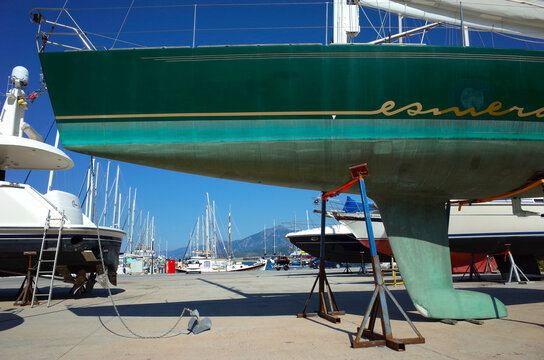 Pythagorion, Samos island, Greece - 14 May, 2018: Close up of sailboat's bottom keel standing on land for repair in Samos marina at Pythagorio village