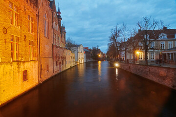 Canals in the evening light in the historic city centre of Bruges in Belgium