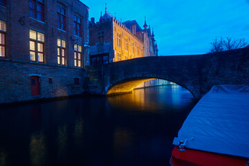 Canals in the evening light in the historic city centre of Bruges in Belgium