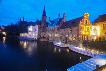 Canals in the evening light in the historic city centre of Bruges in Belgium