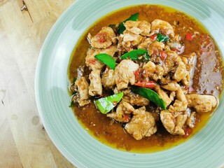 Fried chicken with lemongrass in a plate, ready to serve