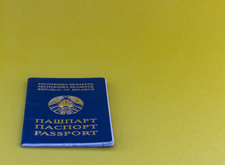 Passport of a citizen of the Republic of Belarus on a yellow background with copy space to add text. Passport is an identity document.