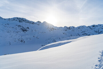 Obraz premium Mountain winter landscape in the Tatras, mountain view covered with snow in frosty sunny weather