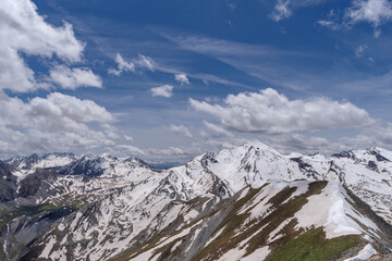 Cottian Alps mountain range view above from Stura di Demonte Valley, Province of Cuneo, Italy