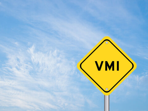 Yellow transportation sign with word VMI (abbreviation of vendor managed inventory) on blue color sky background
