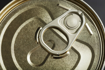 Metal lid with a ring from a tin can