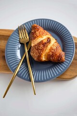 French croissant on a grey plate