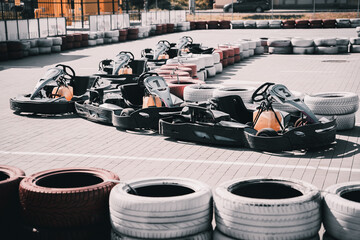 Row of go carts at the track and ready to start