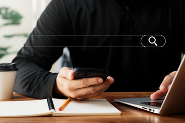 man's hand use smartphone to find things that interest you. Finding information about internet...