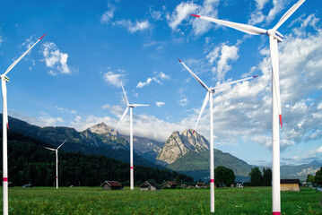 Composite, wind turbines for energy generation in an alpine hut in the Bavarian mountains, concept...