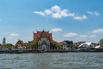 The Buddhist temple Wat Rakhangkhositaram on the banks of the Chao Phraya River, Bangkok, Thailand.