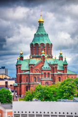 Fototapeta na wymiar Helsinki Uspenski Cathedral on a cloudy day, Finland.