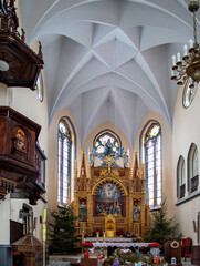 Exterior and interior view of the Neo-Gothic Catholic Church of the Transfiguration of Jesus built in 1907 in the village of Poświętne in Podlasie, Poland.