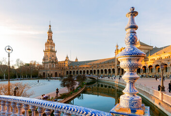 Spain Square (Plaza de Espana), Seville, Spain, built in 1928, is an example of Regionalism architecture that mixes Renaissance and Moorish styles. - obrazy, fototapety, plakaty