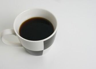 マグカップに入ったホットコーヒー