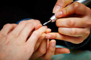  Nail art, close-up of hands trimming nails