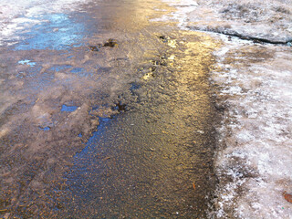 asphalt road covered with ice, slippery road winter