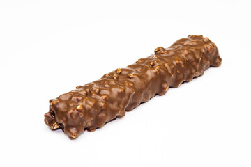 Wafers, cookies and sweets concept with hazelnut and chocolate. Cracked chocolate bar with snack wafers.