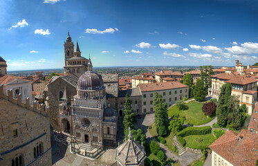 Fototapeta na wymiar Panoramic aerial view of Bergamo Alta from city bell tower on a summer day, Italy