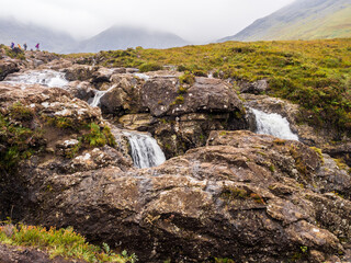 Fairy pools waterfalls shrouded in heavy mist at Glenbrittle, Isle of Skye, Scotland, Uk