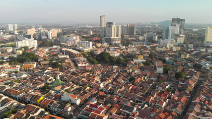 Malacca, Malaysia. Aerial view of city homes and skyline from drone on a clear sunny day