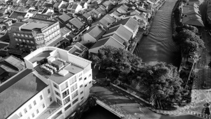 MALACCA, MALAYSIA - DECEMBER 29, 2019: Aerial view of city skyline and river from droneMALACCA, MALAYSIA - DECEMBER 29, 2019: Aerial view of city skyline and river from drone.