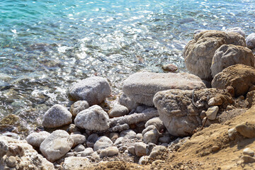 Close up of salt background. Natural salt. Dead Sea salt mineral natural formations. Salt crystals from Dead sea. View of Dead Sea coastline. Texture of Dead sea. Salty seashore