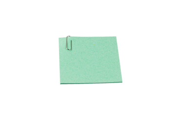 A sticker and a paper clip isolated on a white background