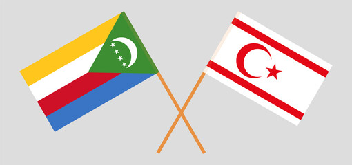 Crossed flags of the Comoros and Northern Cyprus. Official colors. Correct proportion