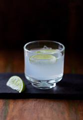 Gin and Tonic on dark background. Close up.	