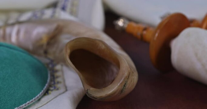 Jewish Orthodox prayer religious symbol with prayer shawl kippah on torah scrol