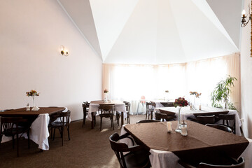 Banqueting hall cafe restaurant interior for dinner celebration or holidays