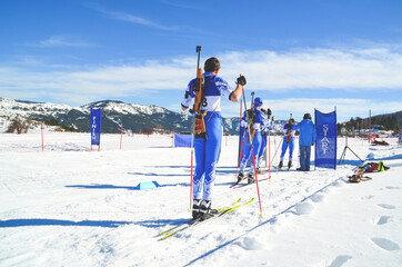 biathlon ski winter sport mens team preparing to start race