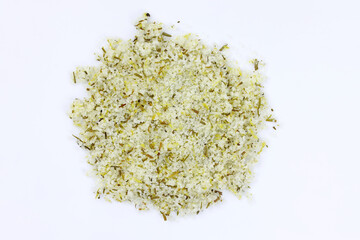 Sea salt with spices on a white background. Seasoning for fish. Sea salt with lemon and dried herbs.