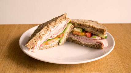 Vegan sandwich with cheese and vegetables.