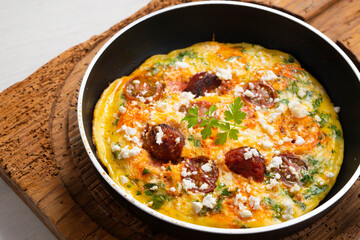 Frittata with egg, chorizo ​​and cherry tomatoes.