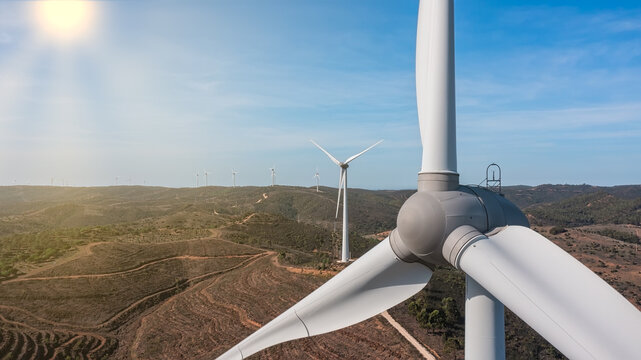 Aerial view wind turbine eco friendly renewable energy concept on Portuguese mountains background.