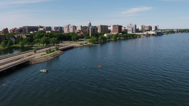Drone Over Lake Monona Along Shoreline in Summer in Madison Wisconsin (Push In Left to Right)