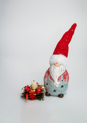 Toy Santa Claus on a white background close-up.